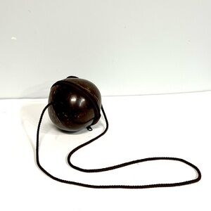 Smooth Polished Coconut Zippered Purse.